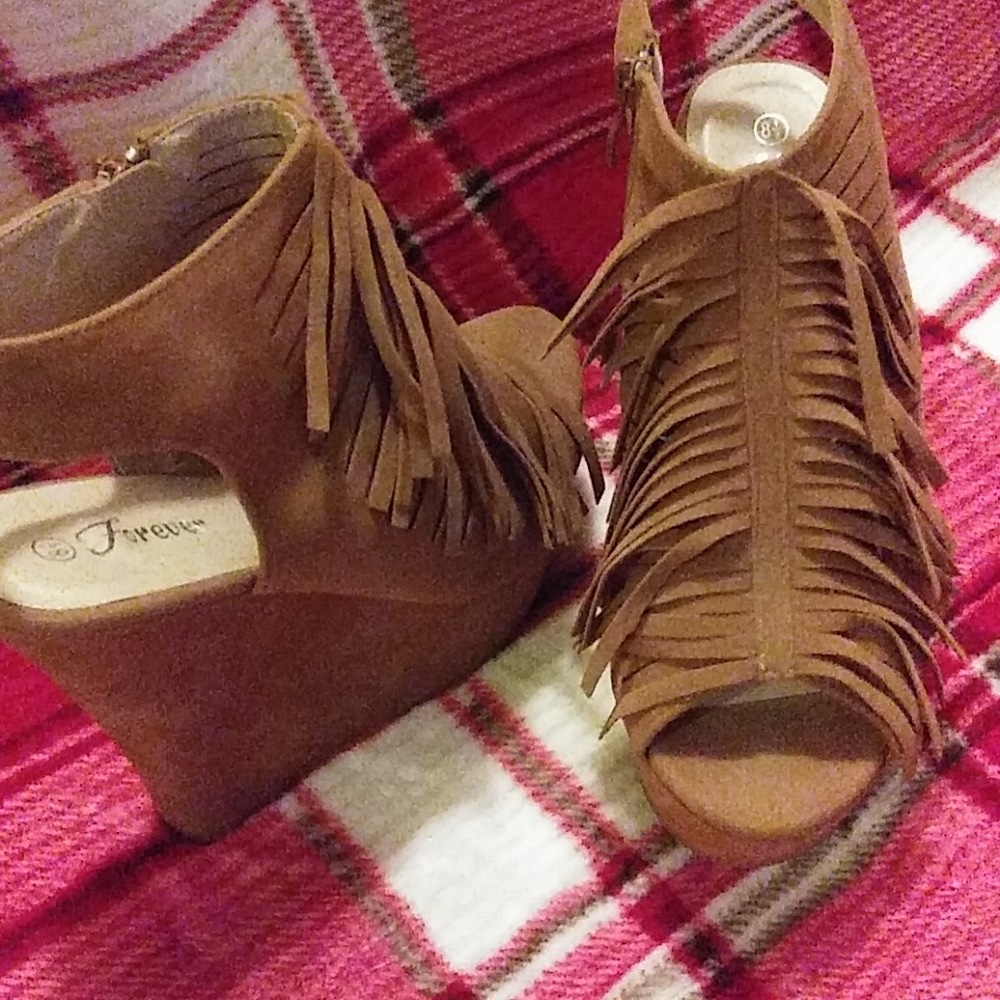 A pair of "Forever" brown wedges size 8× 1.5